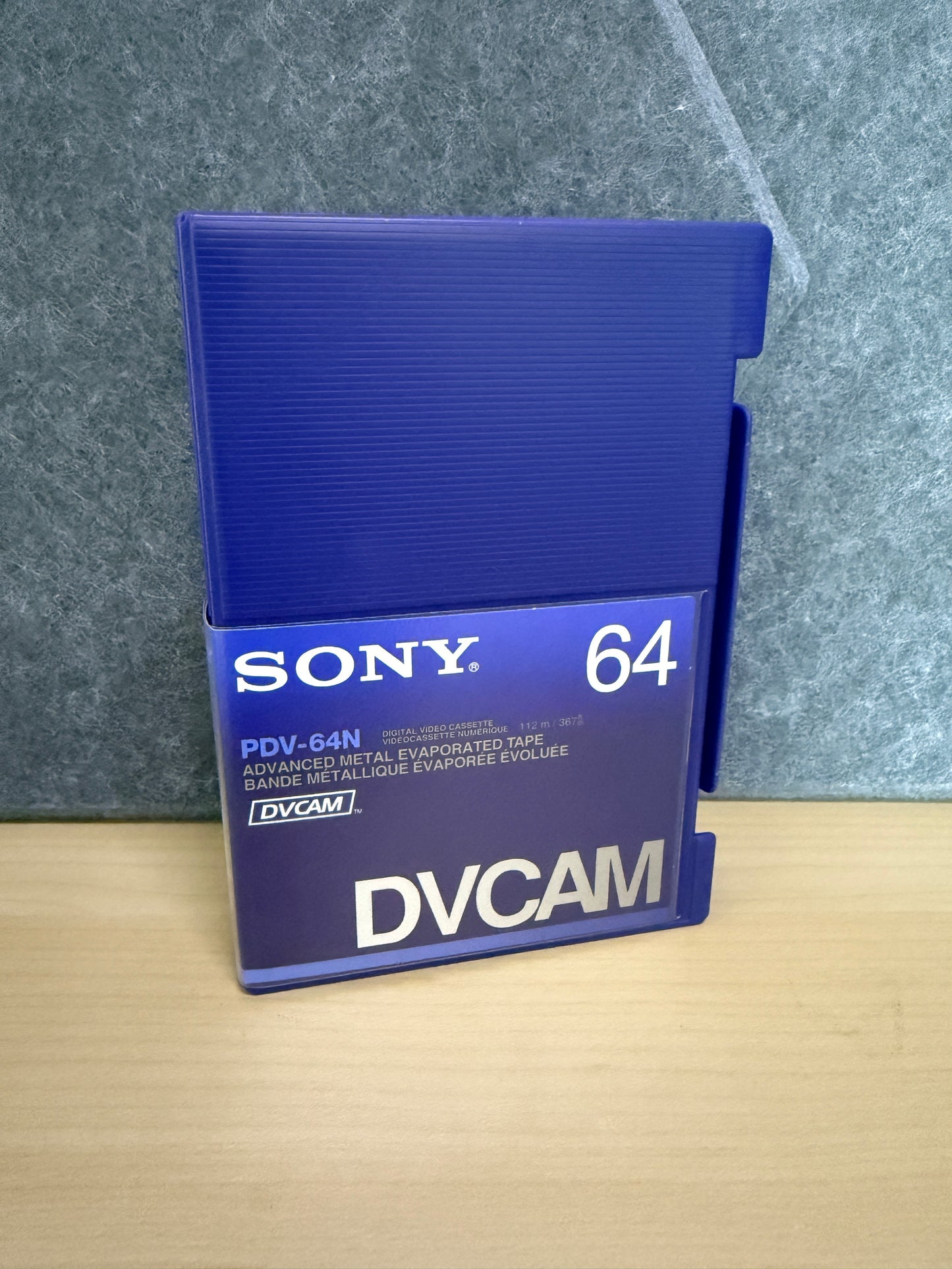 Sony DVCAM tape on a textured surface